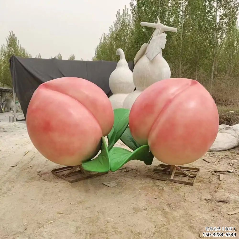 草地水蜜桃雕塑 现代校园果蔬雕塑 大型水果雕塑 草地水蜜桃雕塑 现代校园果蔬雕塑 大型水果雕塑