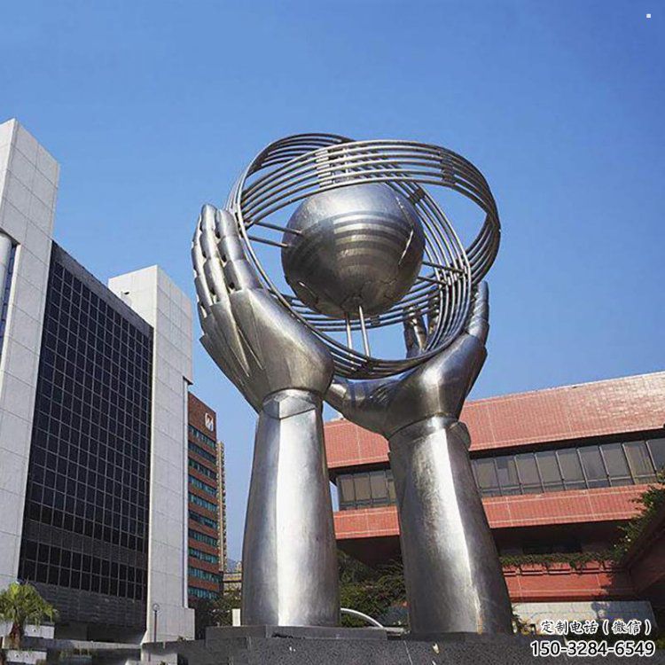 地球仪雕塑定做，小区摆件，镜面手托地球仪雕塑制作
