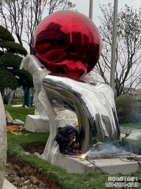 手托圆球雕塑供给，景观概念，手托圆球雕塑定制