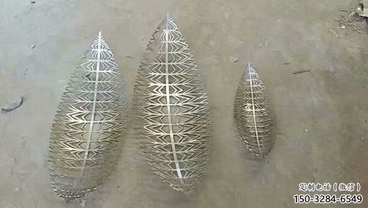 镂空树叶雕塑生产，街道标识，镜面镂空树叶雕塑供应